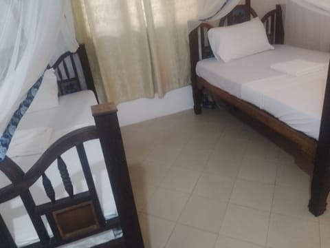 Family Triple Room, Pool View | Iron/ironing board, WiFi (free)