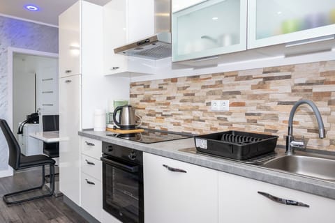Apartment (A1) | Private kitchen | Espresso maker, fridge, microwave, oven