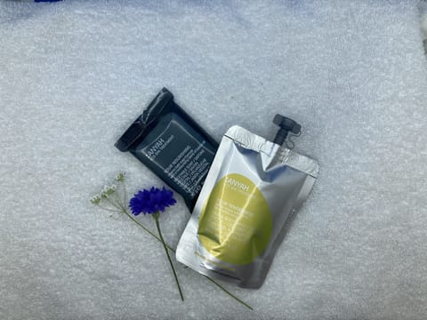 Shower, eco-friendly toiletries, towels