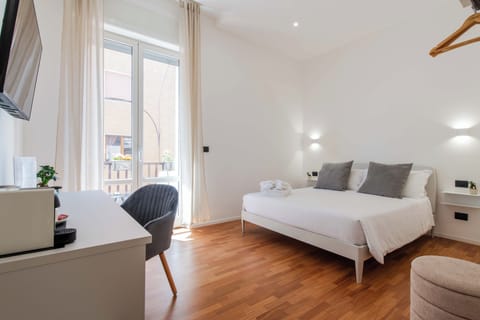 Luxury Double Room, City View | Memory foam beds, minibar, desk, laptop workspace