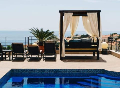 Apartment (Three Bedroom Apartment with Balcony) | Outdoor pool | Seasonal outdoor pool, pool umbrellas, sun loungers