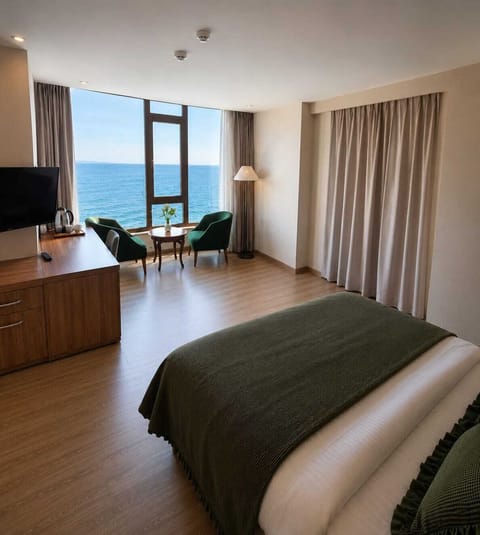 Deluxe Double Room, Sea View | In-room safe, desk, laptop workspace, blackout drapes