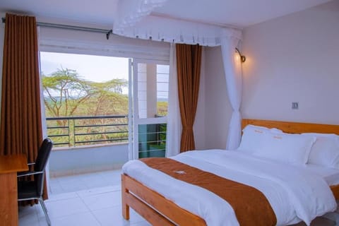 Premium bedding, memory foam beds, desk, laptop workspace
