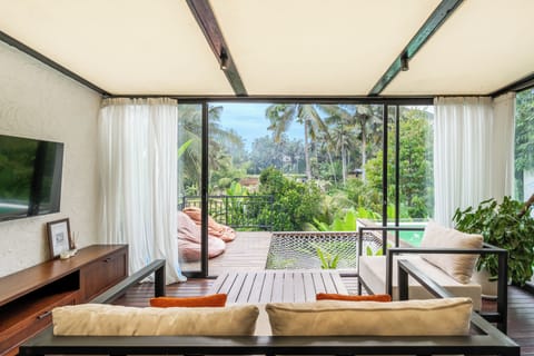 Luxury Villa, Pool View | Living area | 50-inch Smart TV with digital channels