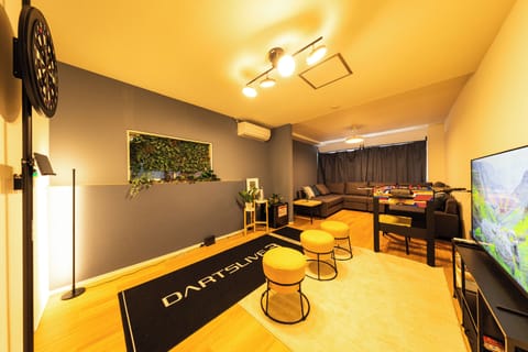 Apartment | Living area | 32-inch flat-screen TV with cable channels