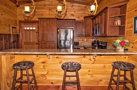 Microwave, coffee/tea maker, cleaning supplies, paper towels