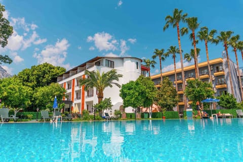 Seasonal outdoor pool, open 8 AM to 6:30 PM, pool umbrellas