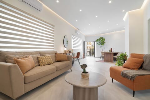 Apartment, 3 Bedrooms, City View | Living room | 50-inch Smart TV with satellite channels, Netflix, streaming services