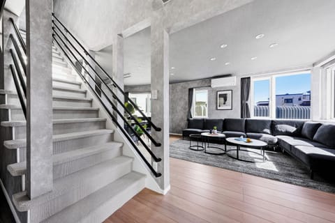 Apartment | Living area | 50-inch flat-screen TV with digital channels, foosball