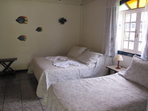 Standard Suite, 1 Bedroom, Lanai, Garden View | Minibar, blackout drapes, free WiFi, bed sheets