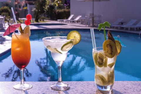 2 outdoor pools, open 9:00 AM to 10:00 PM, pool umbrellas, sun loungers