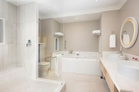 Suite | Bathroom | Rainfall showerhead, hair dryer, towels, soap