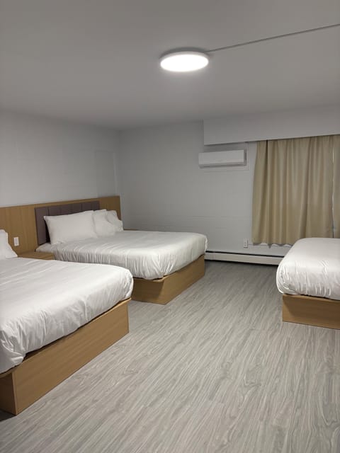 Family Room, Multiple Beds, Non Smoking | Free WiFi, bed sheets