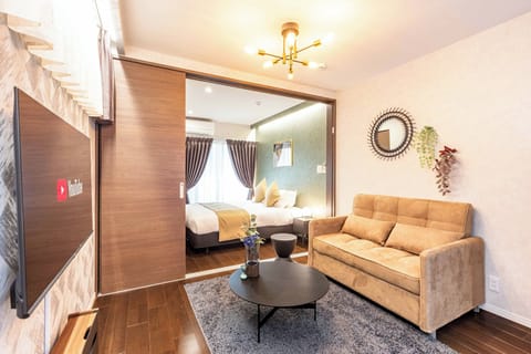Standard Apartment, Lanai | Desk, blackout drapes, iron/ironing board, WiFi (free)