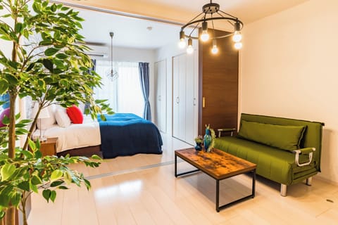 Standard Apartment, Lanai | Desk, blackout drapes, iron/ironing board, WiFi (free)