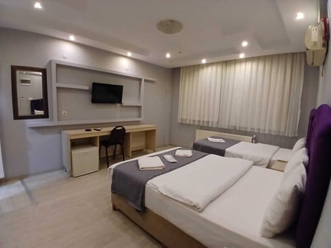 Twin Room, City View | Premium bedding, minibar, desk, laptop workspace