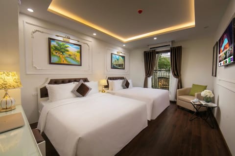 Family Suite, 2 Queen Beds, Balcony, City View | Hypo-allergenic bedding available, down comforters, minibar