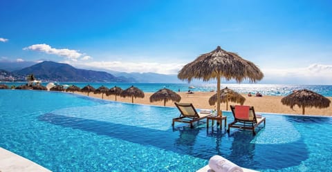 Outdoor pool, free cabanas, pool umbrellas