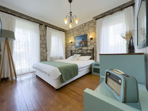 Deluxe Cift Kisilik veya iki Yatakli Oda | Premium bedding, down comforters, minibar, in-room safe