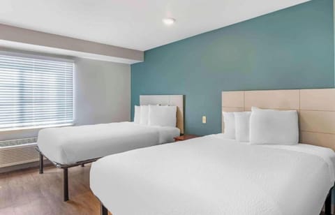 Room, 2 Queen Beds, Non Smoking (Kitchen) | Free WiFi, bed sheets