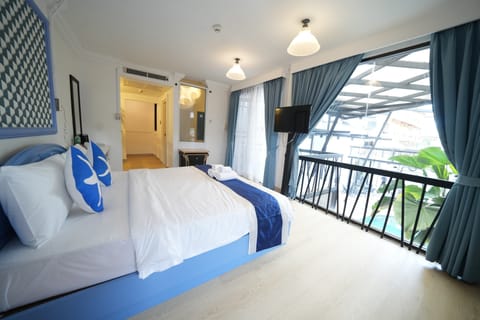 Standard Double Room, Balcony, Pool View | Desk, laptop workspace, WiFi (free), bed sheets