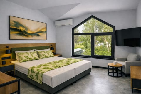 Economy Double Room | Desk, blackout drapes, iron/ironing board, free WiFi