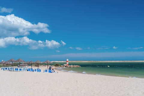 Beach nearby, beach umbrellas, beach towels