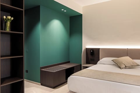 Superior Double Room, Courtyard View | In-room safe, desk, laptop workspace, blackout drapes
