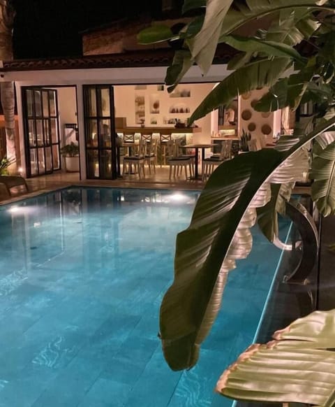Outdoor pool, open 9:00 AM to 7:00 PM, pool umbrellas, sun loungers