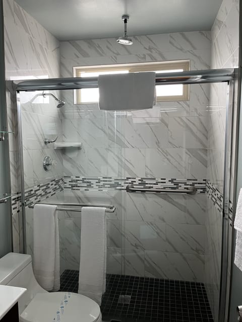 Shower, free toiletries, towels, soap