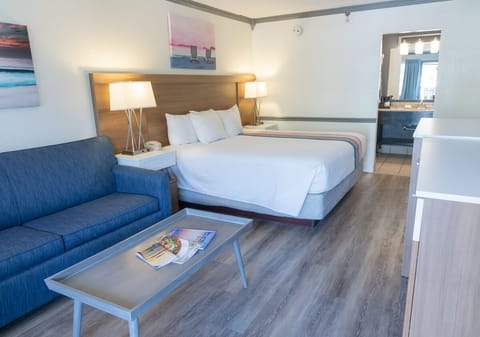 King Bed w/ Partial View | Egyptian cotton sheets, premium bedding, desk, iron/ironing board