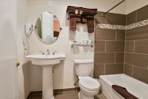 Bathtub, free toiletries, hair dryer, towels