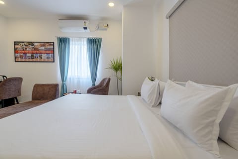 Family Room, City View | Desk, laptop workspace, soundproofing, iron/ironing board