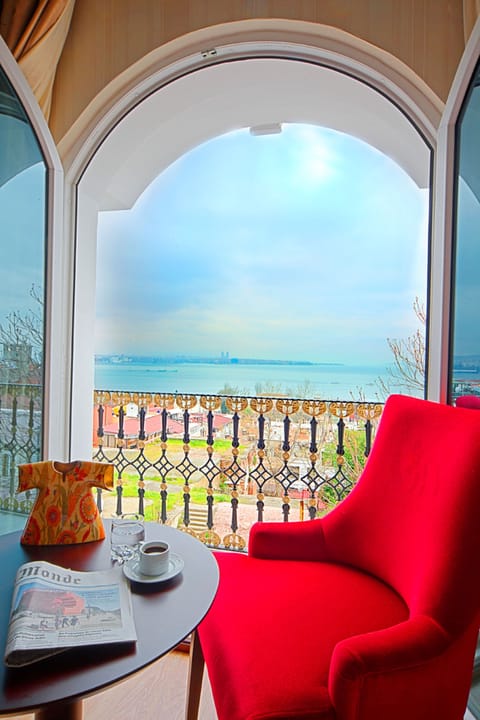 Suite, Sea View, Corner | Living area | 43-inch LCD TV with satellite channels, TV