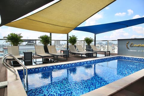 Outdoor pool, pool umbrellas, sun loungers
