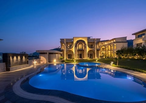 2 outdoor pools, open 8:00 AM to 8:00 PM, pool umbrellas, sun loungers