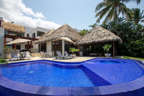 Apartment, 4 Bedrooms, Balcony, Sea View | Pool | Outdoor pool, free cabanas, pool umbrellas