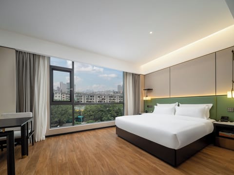 Basic Single Room, 1 Queen Bed, Housekeeping, City View | Blackout drapes, iron/ironing board, free WiFi