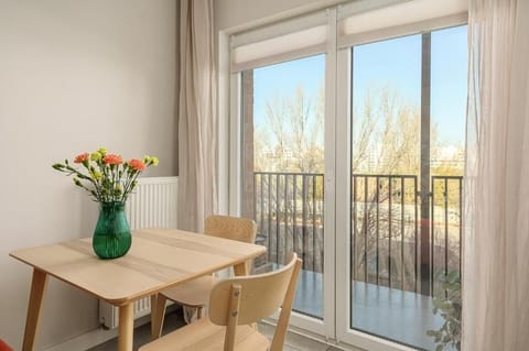 Luxury Apartment, Balcony, Courtyard View | In-room dining