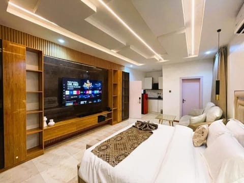 Deluxe Apartment, Balcony, City View | In-room safe, desk, laptop workspace, soundproofing