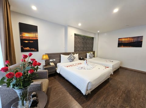 Family Triple Room | Hypo-allergenic bedding available, down comforters, desk