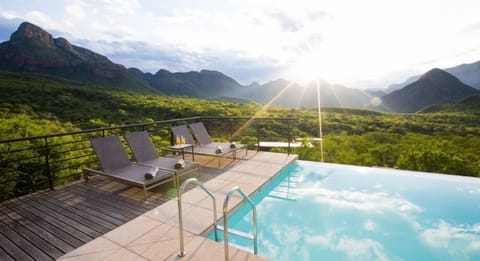 Outdoor pool, open 10:00 AM to 6:30 PM, pool umbrellas, sun loungers