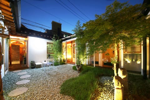 Family Room, 2 Double Beds, Courtyard View | Garden view