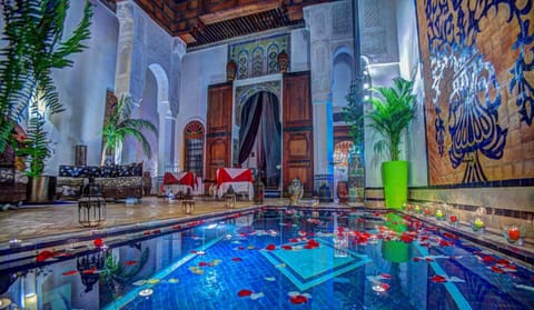 Indoor pool, outdoor pool, pool umbrellas, sun loungers