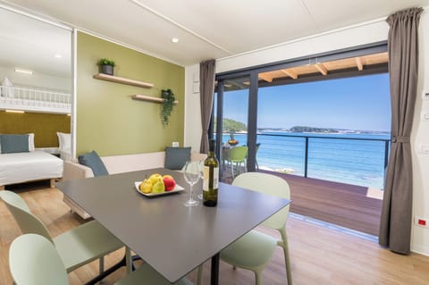 Camping Home first row to the Sea | Living area | TV