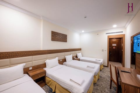 Quadruple Room | In-room safe, blackout drapes, iron/ironing board (on request)