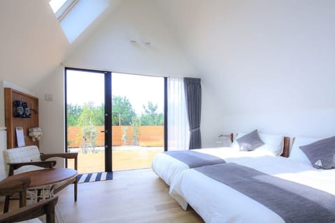 Family Quadruple Room, Non Smoking, Garden View (Room Only) | Desk, blackout drapes, WiFi (free), bed sheets