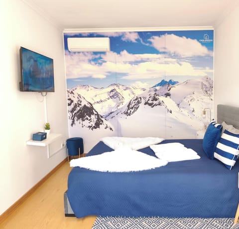 Apartment, Patio, City View | Iron/ironing board, WiFi (free)