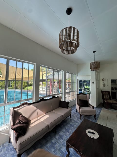 House, Garden View | Living area | 50-inch flat-screen TV with digital channels