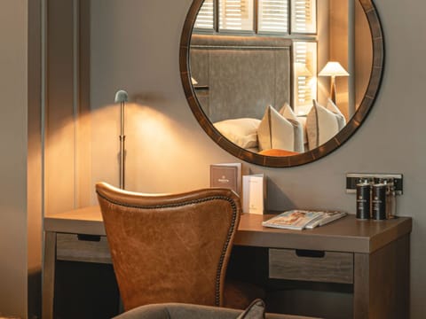 Signature Suite | Premium bedding, in-room safe, desk, iron/ironing board